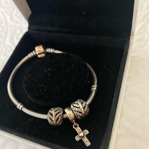 Rose gold Pandora bracelet and charm bundle